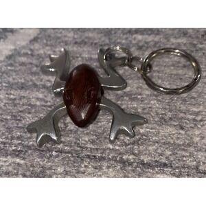 Frog Key chair Silver Metal With Wood Detailing Of Frog